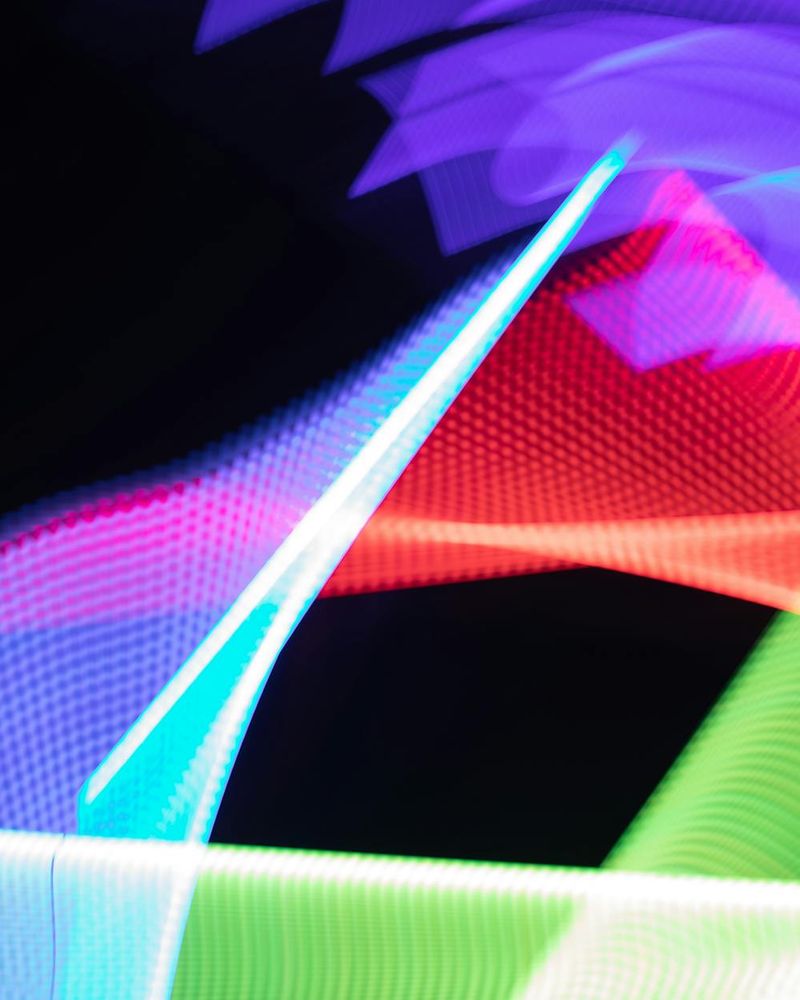 Abstract glowing geometric shapes representing male health support